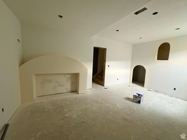 341 N Barlow Ct, Saratoga Springs, UT 84045 - unfurnished living room with arched walkways