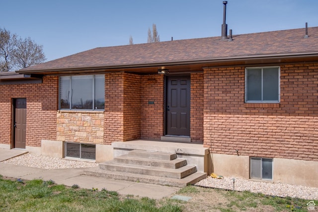 1520 Rushton St, Ogden, UT 84401 - doorway to property with brick siding and a shingled roof