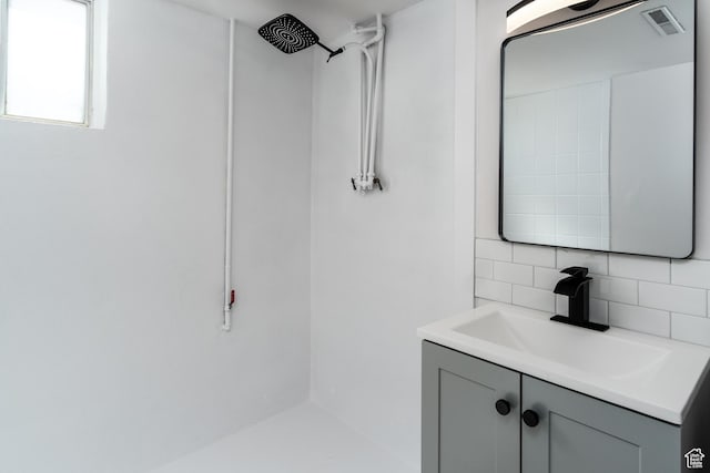 1520 Rushton St, Ogden, UT 84401 - full bathroom featuring a shower, tasteful backsplash, vanity, and visible vents