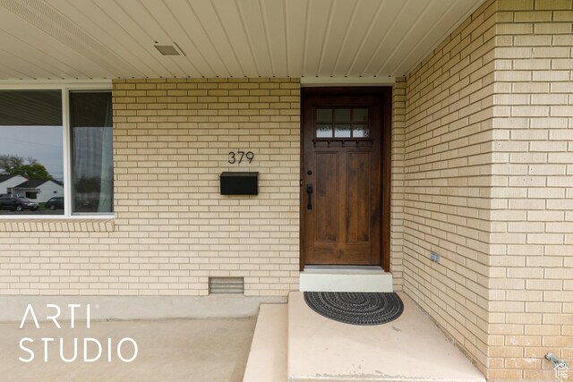 379 E 100 S, Kaysville, UT 84037 - property entrance with crawl space and brick siding