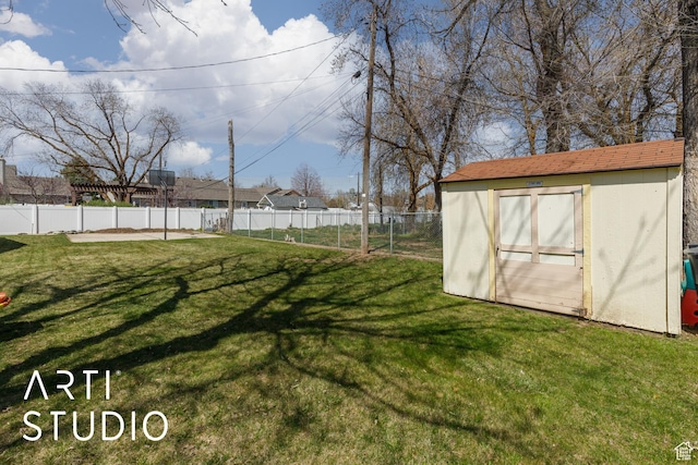379 E 100 S, Kaysville, UT 84037 - view of yard featuring a storage unit, fence, and an outbuilding