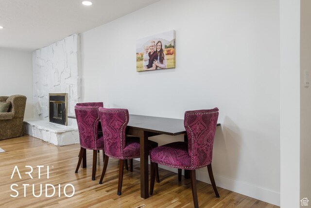 379 E 100 S, Kaysville, UT 84037 - dining area featuring a fireplace, wood finished floors, recessed lighting, and baseboards