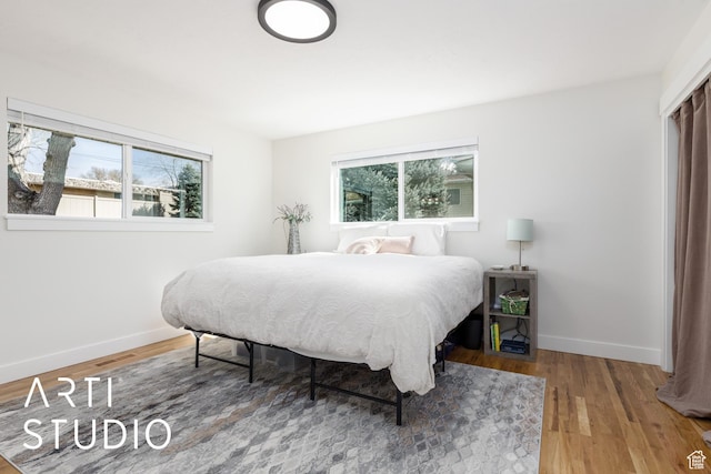 379 E 100 S, Kaysville, UT 84037 - bedroom featuring wood finished floors and baseboards