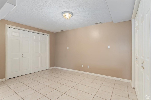 14883 S 3200 W, Bluffdale, UT 84065 - unfurnished bedroom featuring a closet, visible vents, baseboards, and a textured ceiling