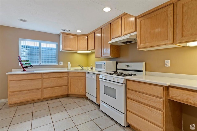 14883 S 3200 W, Bluffdale, UT 84065 - kitchen with light tile patterned floors, a sink, light countertops, white appliances, and under cabinet range hood