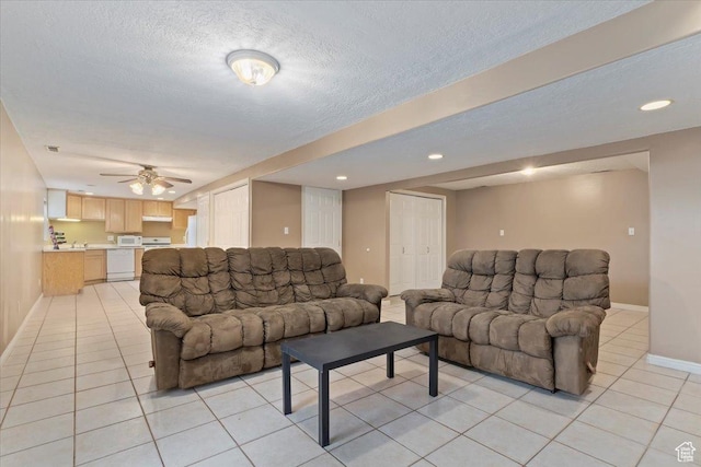 14883 S 3200 W, Bluffdale, UT 84065 - living area with baseboards, recessed lighting, a textured ceiling, light tile patterned flooring, and ceiling fan