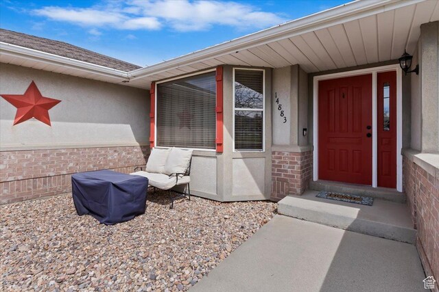 14883 S 3200 W, Bluffdale, UT 84065 - doorway to property with stucco siding and brick siding