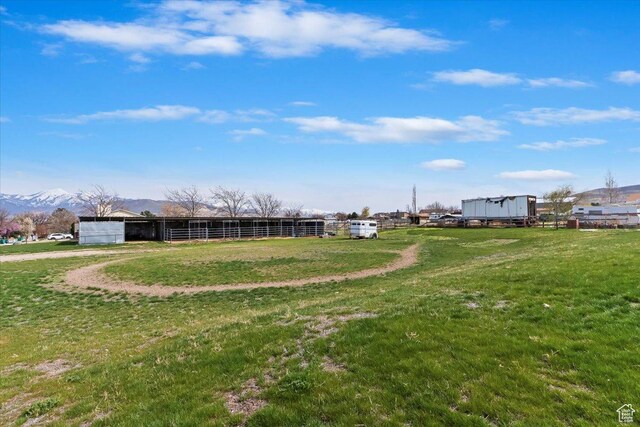 14883 S 3200 W, Bluffdale, UT 84065 - exterior space featuring a yard, an outdoor structure, and a mountain view