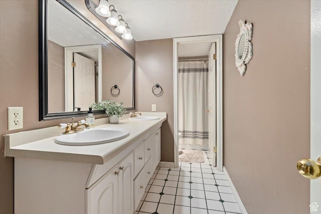 14883 S 3200 W, Bluffdale, UT 84065 - bathroom with a shower with shower curtain, double vanity, baseboards, and a sink