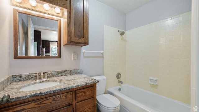full bathroom with toilet, vanity, and shower / tub combination