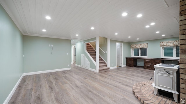 kitchen with recessed lighting, light wood-style flooring, and baseboards