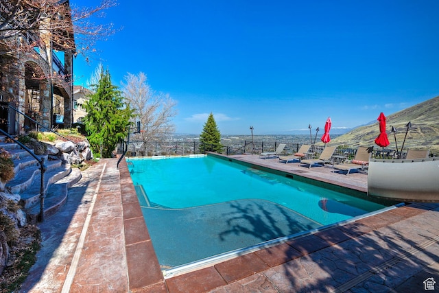 13879 S Standing Oak Dr E, Draper, UT 84020 - pool with a patio area and fence