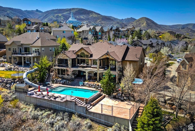 13879 S Standing Oak Dr E, Draper, UT 84020 - exterior space featuring a patio, a mountain view, a water slide, and a residential view