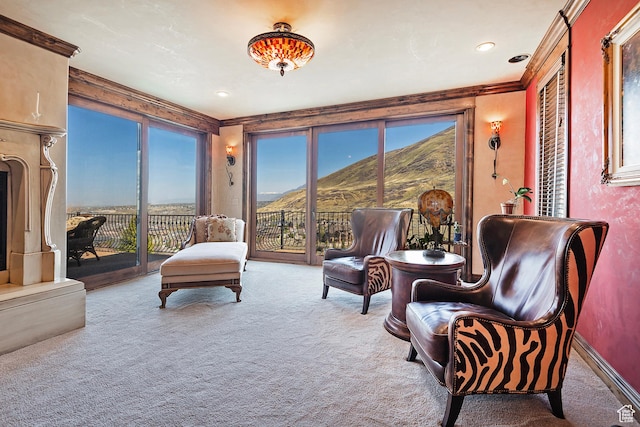 13879 S Standing Oak Dr E, Draper, UT 84020 - sitting room with plenty of natural light, a mountain view, ornamental molding, and carpet floors