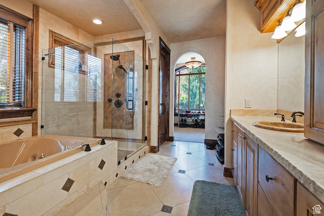 13879 S Standing Oak Dr E, Draper, UT 84020 - full bath with a shower stall, tile patterned floors, vanity, and a tub with jets