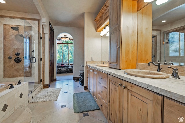 13879 S Standing Oak Dr E, Draper, UT 84020 - full bathroom featuring a stall shower, double vanity, a sink, and a bathtub