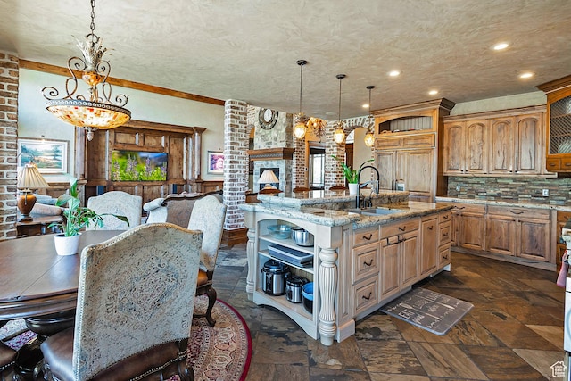 13879 S Standing Oak Dr E, Draper, UT 84020 - kitchen featuring open shelves, a sink, a center island with sink, backsplash, and stone finish flooring