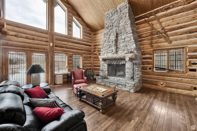 4100 Buck Way Unit 1947, Heber City, UT 84032 - living room featuring log walls, high vaulted ceiling, a fireplace, and hardwood / wood-style flooring