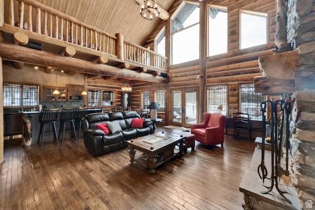 4100 Buck Way Unit 1947, Heber City, UT 84032 - living room featuring log walls, high vaulted ceiling, wood-type flooring, and plenty of natural light