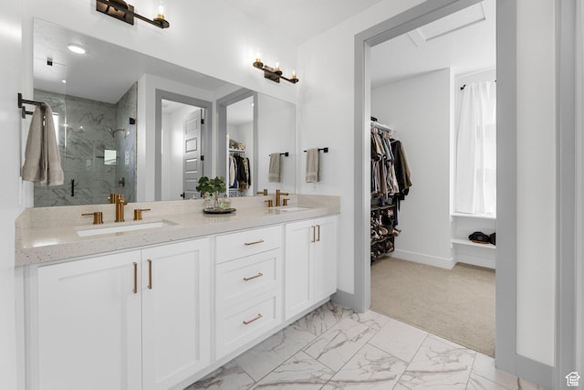 3248 S Forest Ave, Saratoga Springs, UT 84045 - bathroom with a sink, a spacious closet, a marble finish shower, and baseboards