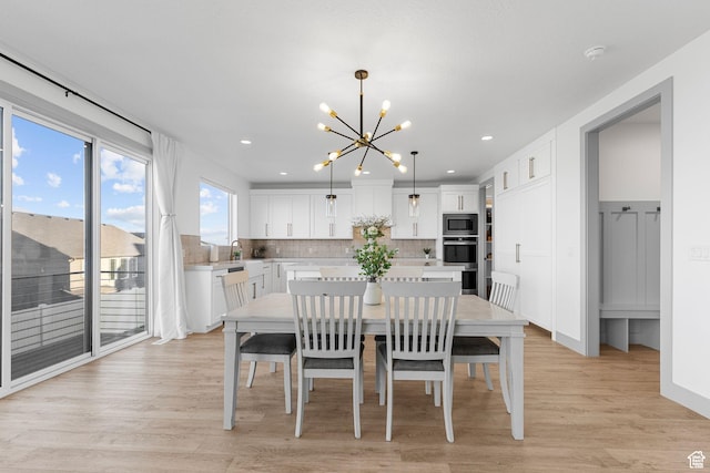 3248 S Forest Ave, Saratoga Springs, UT 84045 - dining room featuring recessed lighting, an inviting chandelier, and light wood-style floors