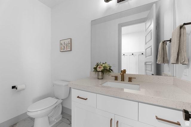 3248 S Forest Ave, Saratoga Springs, UT 84045 - bathroom featuring toilet, marble finish floor, baseboards, and vanity