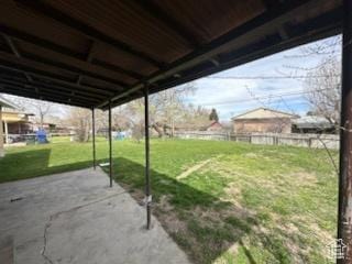 view of yard with a patio and fence