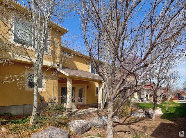 exterior space featuring stucco siding