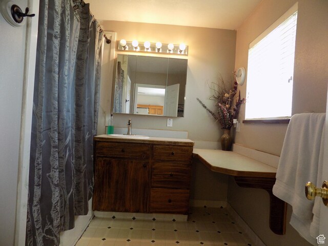 475 W 100 N, Aurora, UT 84620 - bathroom featuring vanity, tile patterned floors, and a shower with curtain