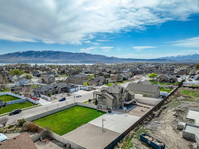birds eye view of property with a residential view and a mountain view