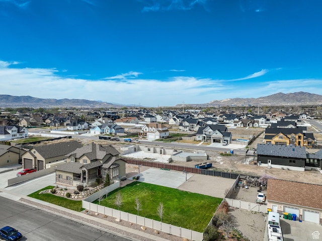 birds eye view of property featuring a residential view and a mountain view