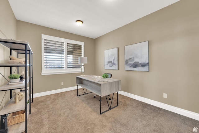 carpeted office with baseboards