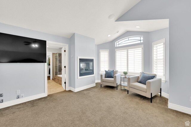 sitting room featuring baseboards, vaulted ceiling, carpet, and recessed lighting