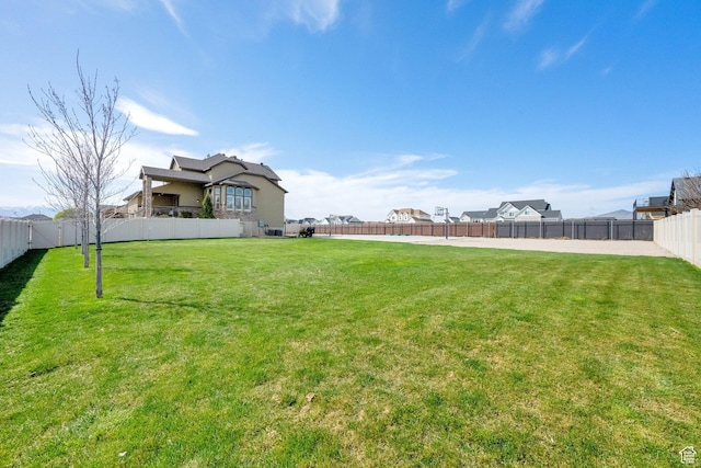 view of yard featuring a fenced backyard