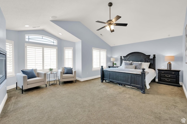 bedroom with baseboards, carpet flooring, ceiling fan, and vaulted ceiling