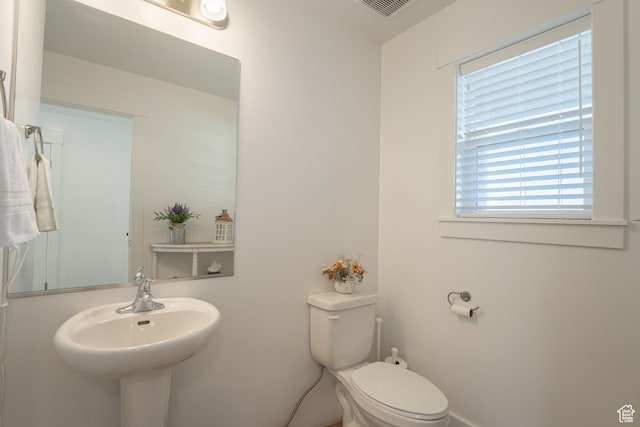 3048 S 400 W, Nibley, UT 84321 - half bath featuring visible vents, toilet, and baseboards