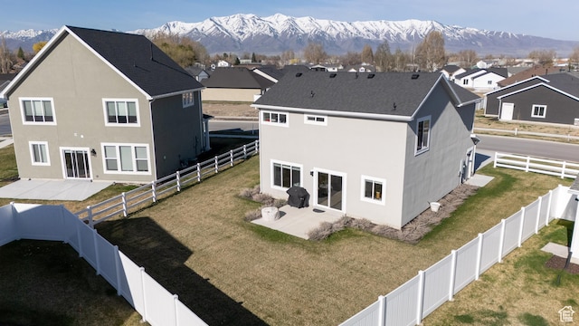 3048 S 400 W, Nibley, UT 84321 - rear view of house featuring a patio area, stucco siding, and a fenced backyard
