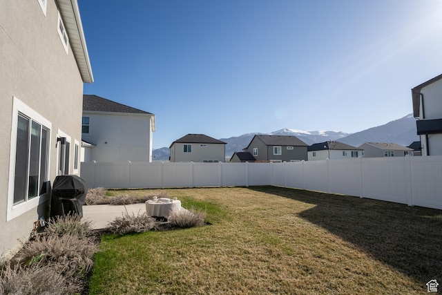 3048 S 400 W, Nibley, UT 84321 - view of yard with a mountain view and a fenced backyard