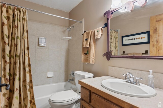 17 Wedge Way, Garden City, UT 84028 - full bath featuring vanity, toilet, and shower / bathtub combination with curtain