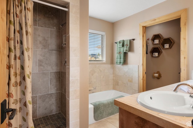 17 Wedge Way, Garden City, UT 84028 - bathroom with a stall shower, a garden tub, tile patterned flooring, and vanity