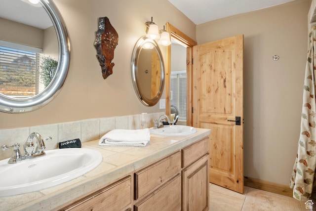 17 Wedge Way, Garden City, UT 84028 - bathroom with double vanity and tile patterned floors