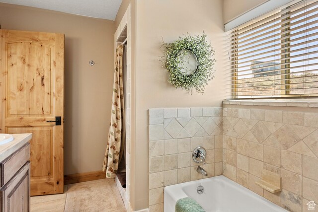 17 Wedge Way, Garden City, UT 84028 - full bath with a garden tub, vanity, and a shower with curtain