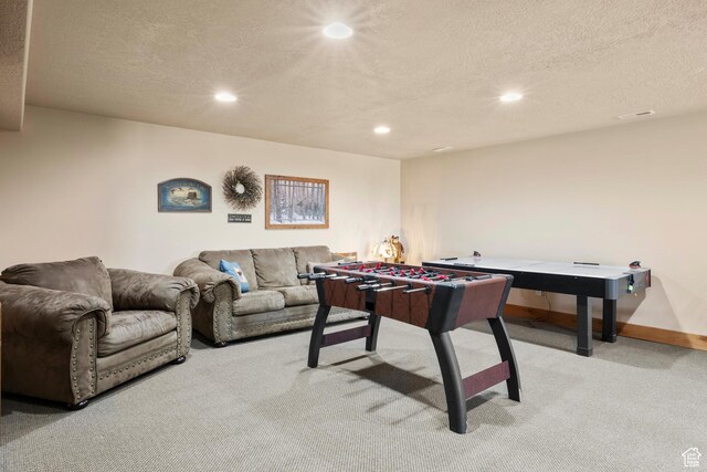 17 Wedge Way, Garden City, UT 84028 - recreation room with carpet, recessed lighting, baseboards, and a textured ceiling