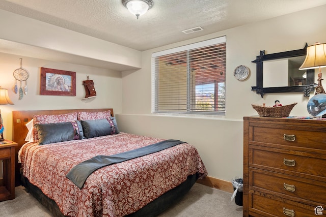 17 Wedge Way, Garden City, UT 84028 - bedroom with carpet flooring, a textured ceiling, and baseboards