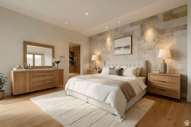 2499 River Meadows Ln, Midway, UT 84049 - bedroom with recessed lighting, light wood-style floors, tile walls, and an accent wall