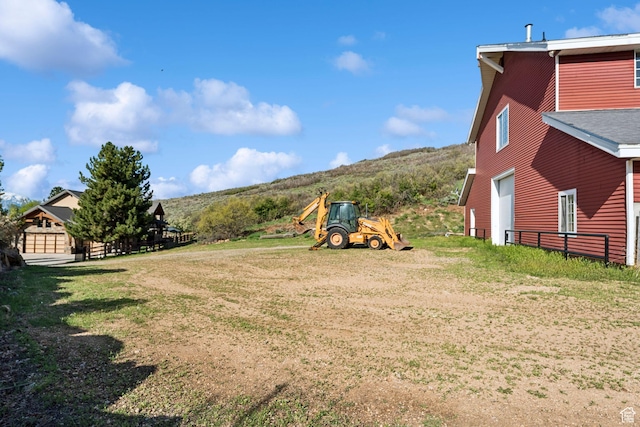 2499 River Meadows Ln, Midway, UT 84049 - view of yard featuring a garage and a mountain view