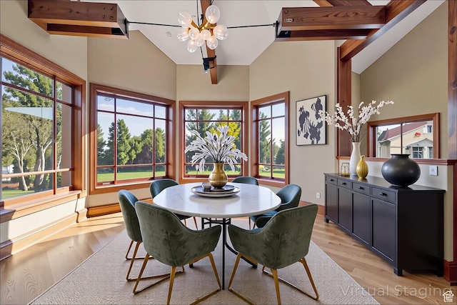 2499 River Meadows Ln, Midway, UT 84049 - dining room featuring a chandelier, light wood-style flooring, plenty of natural light, and high vaulted ceiling