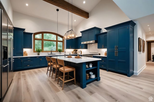 2499 River Meadows Ln, Midway, UT 84049 - kitchen featuring blue cabinets, light countertops, light wood-style floors, recessed lighting, and stainless steel built in refrigerator