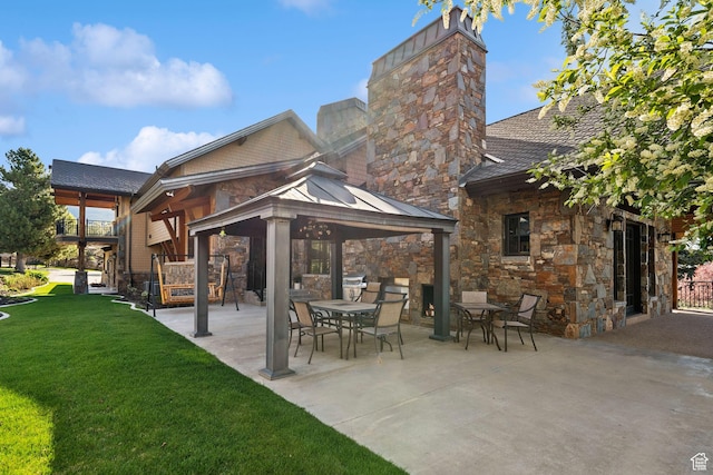 2499 River Meadows Ln, Midway, UT 84049 - rear view of house with a gazebo, a yard, a patio area, and stone siding