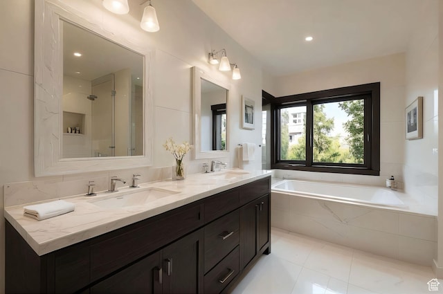 2499 River Meadows Ln, Midway, UT 84049 - full bathroom featuring a garden tub, double vanity, a shower, and tile patterned flooring
